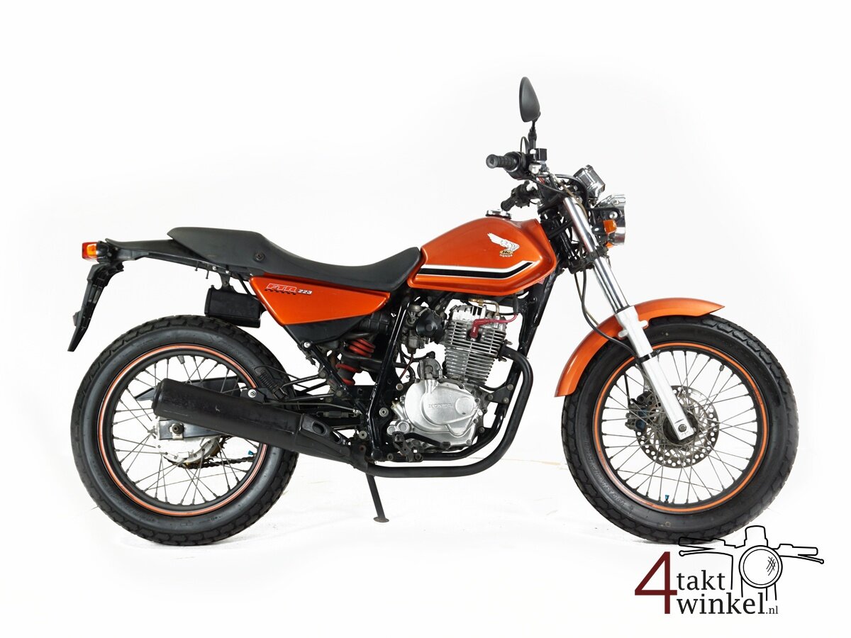 VERKOCHT Honda FTR223, oranje, 14593km