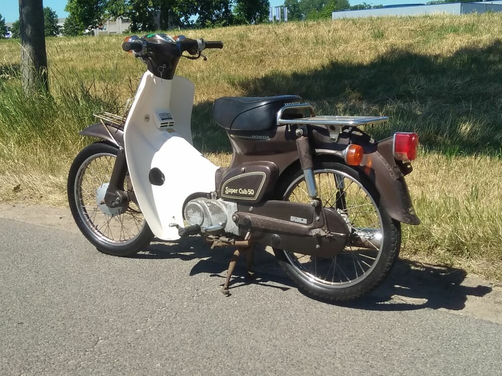 VERKOCHT ! Honda C50 NT Japans, bruin, 4525 km, met kenteken