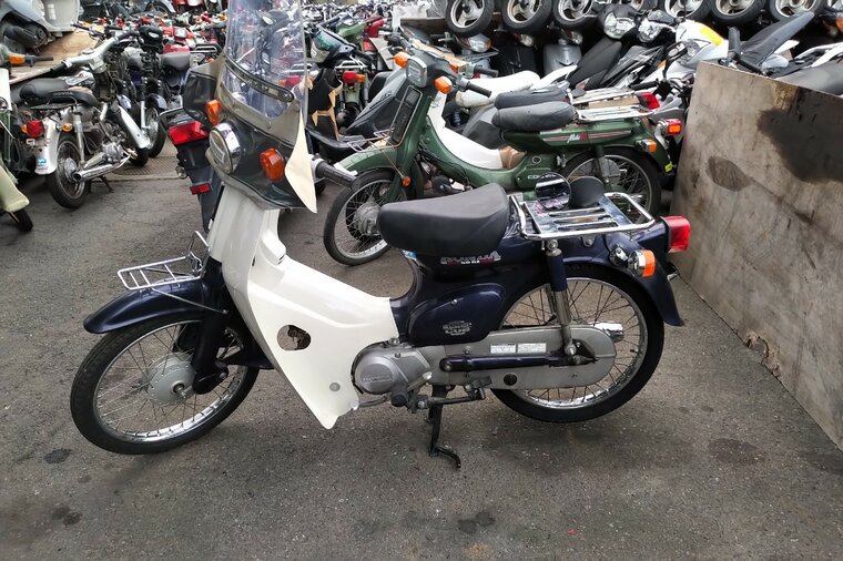 VERWACHT: Honda C50 NT, Japans, Paars, 5191 km