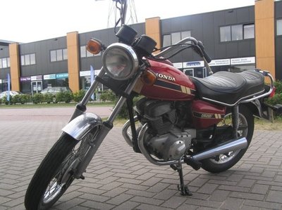 Honda CM200 candy rood, 24.082 mijl